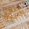 7f298ab6-5494-4c41-b6bf-ab00c4da0f4e T&C A Set of 86 Fashionable And Elegant Jewelry Pieces for Women, Including Necklaces, Earrings,